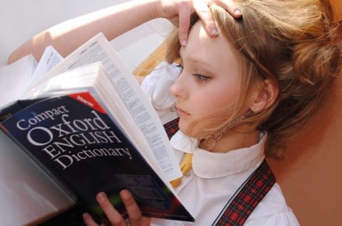 child reading the dictionary